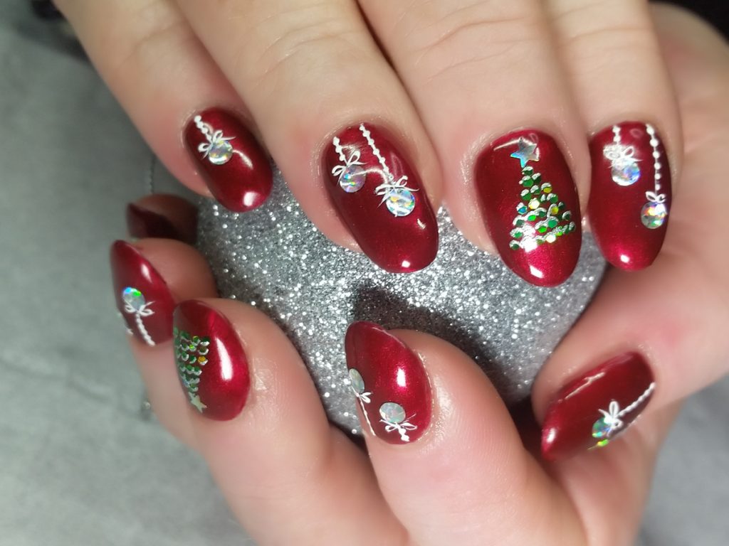 Xmas design over red gel with hand painted trees and glitter baubles