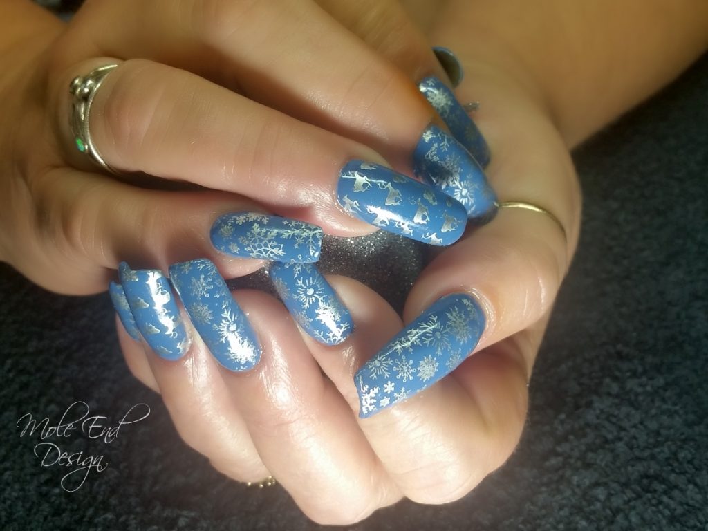 Xmas stamping over blue gel