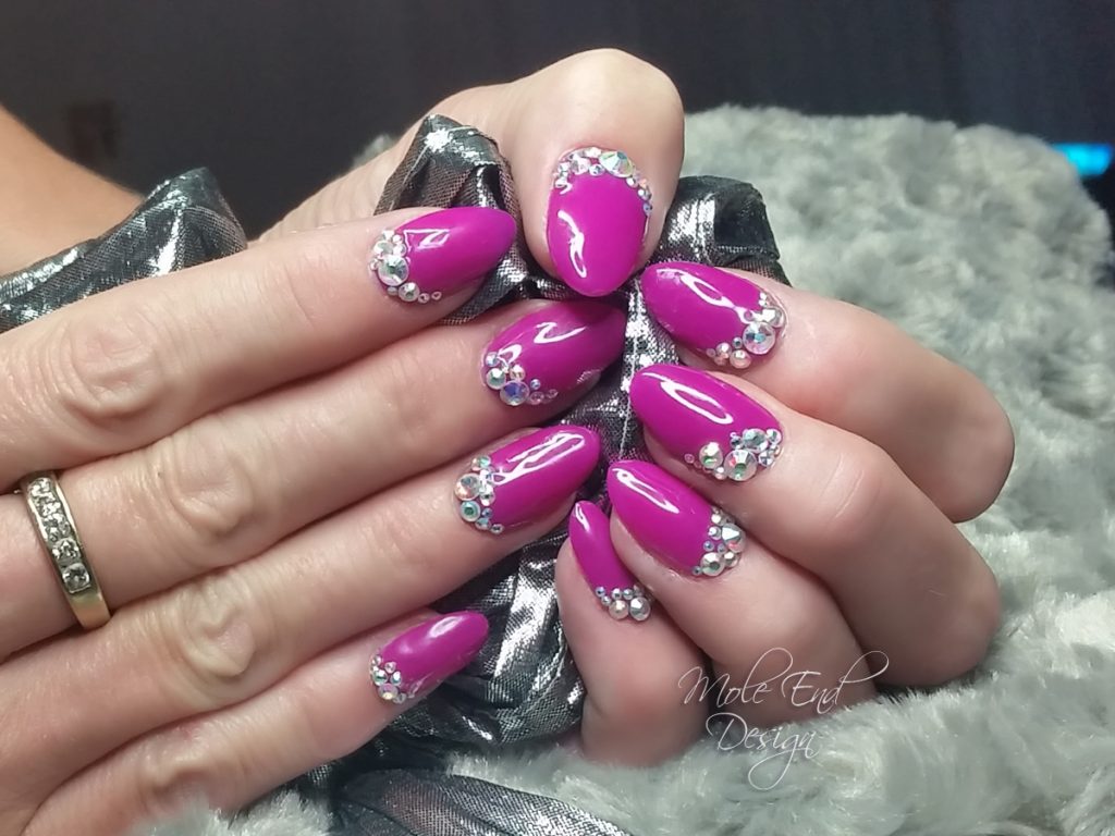 Tahiti hottie with bling purple nails